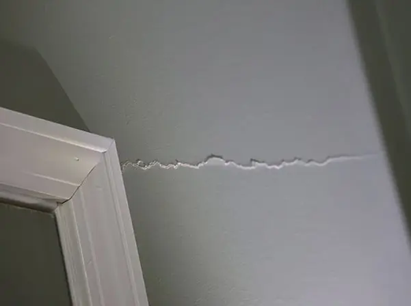 crack by door frame