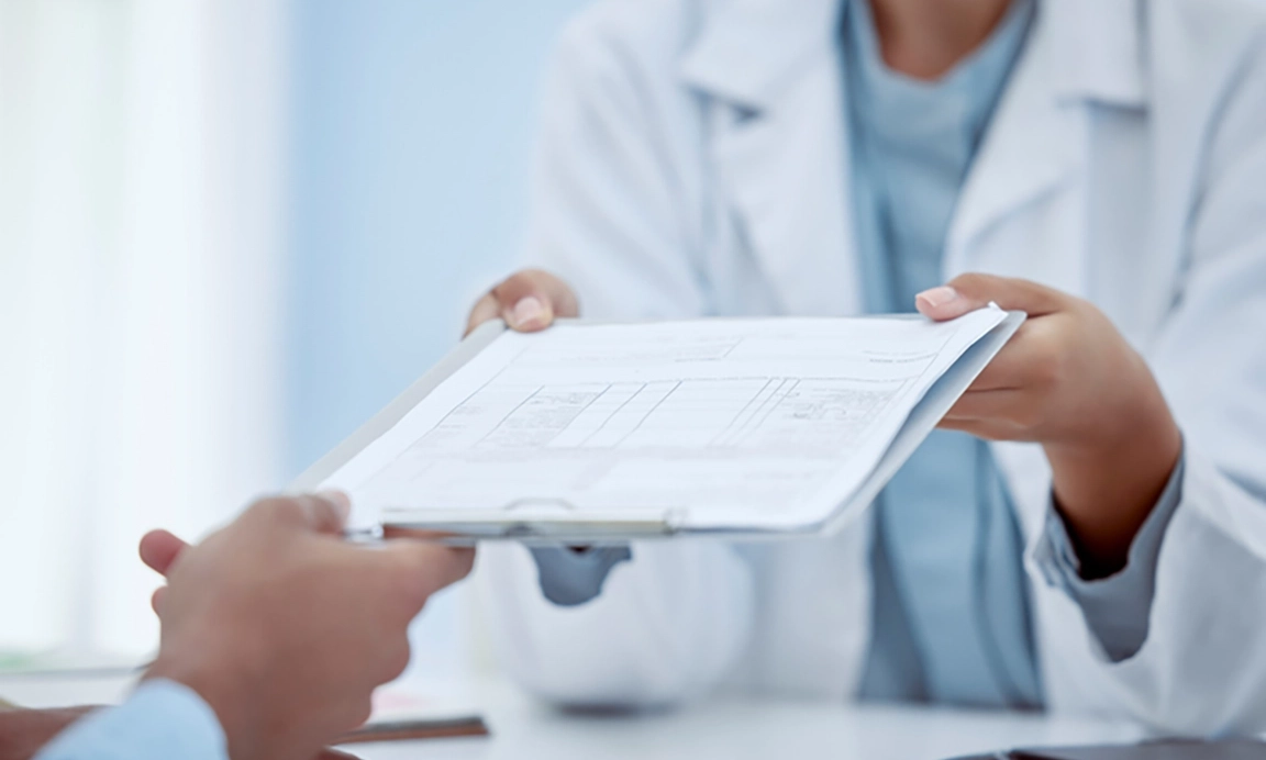 Doctor delivering genetic test results to patient